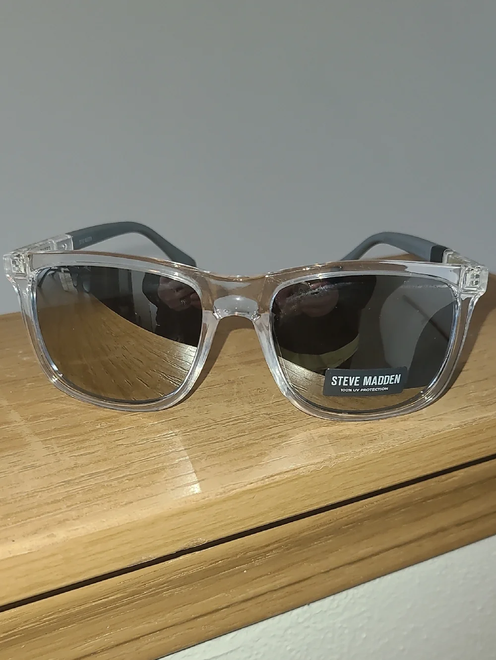 Steve Madden Clear Frame Sunglasses with Reflective Lenses